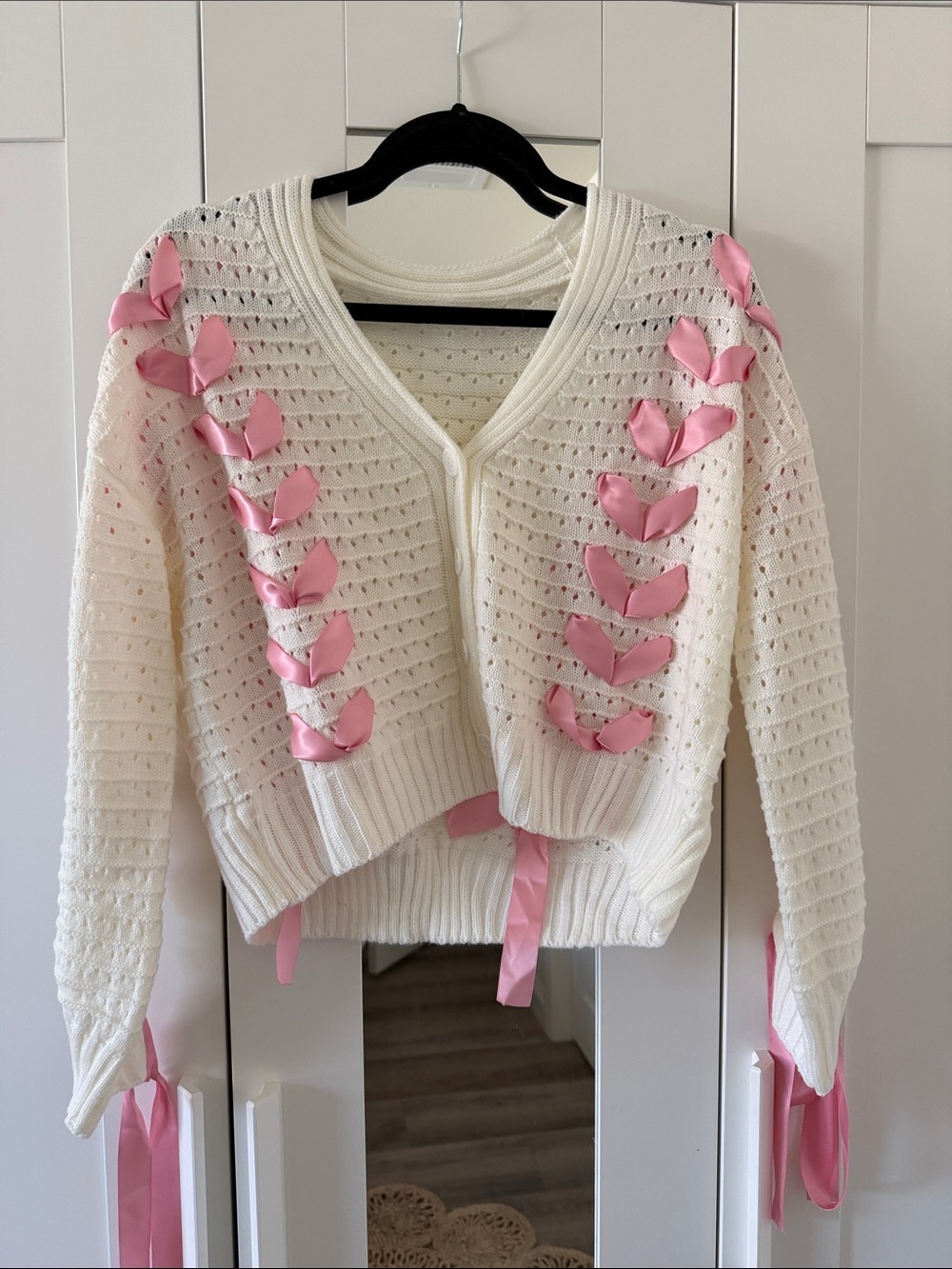 Women's Cream Knit Cardigan with Pink Ribbon Detail size small new without tags